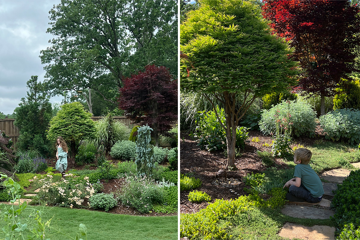 Children in a beautiful garden with Japanese Maples and a fairy garden.